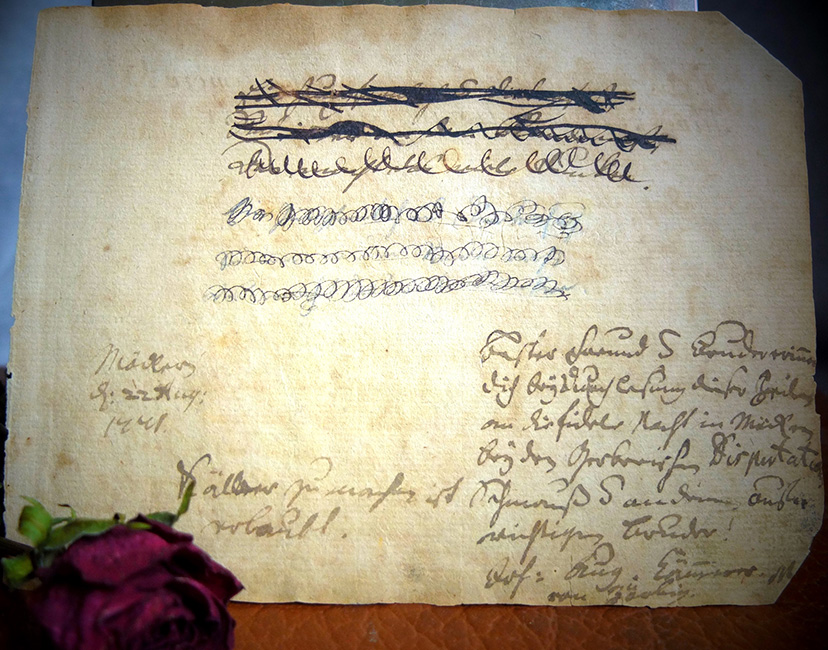 ausgerissene Buchseite mit handschriftlicher Nachricht von Johann August Kämmerer von 1771